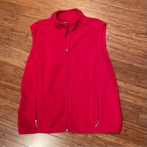 Red fleece sleeveless vest, zippered front & side pockets, size Petite Large.